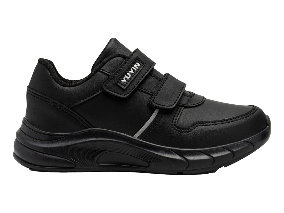 Zapato escolar negro de microfibra para niño con cierre de velcro y suela robusta.