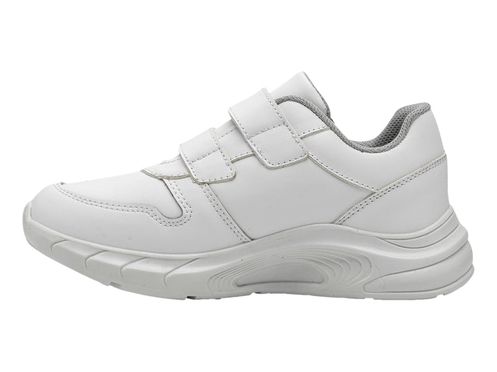 Zapato deportivo escolar blanco para niño con cierre de velcro y suela blanca.