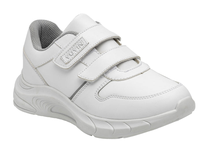 Tenis escolares blancos para niños con cierres de velcro y suela blanca.