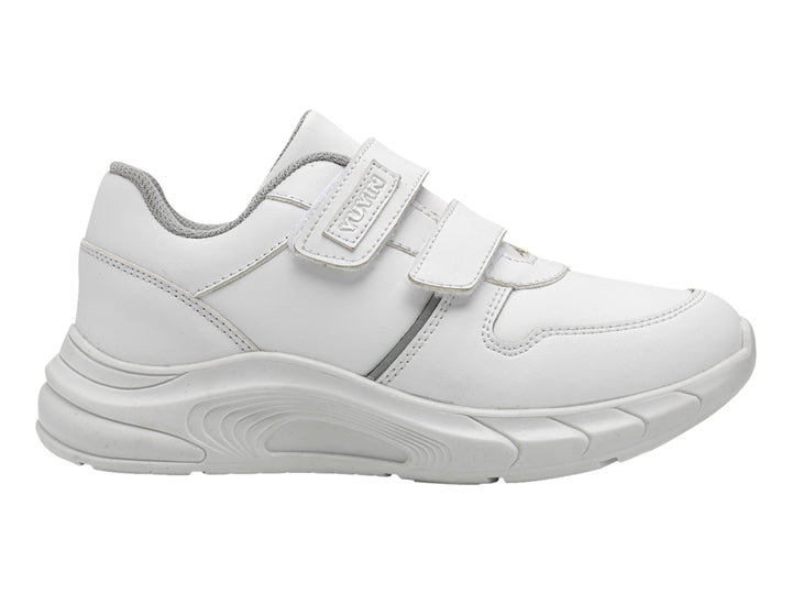 Tenis escolares blancos para niños con cierres de velcro y suela blanca.