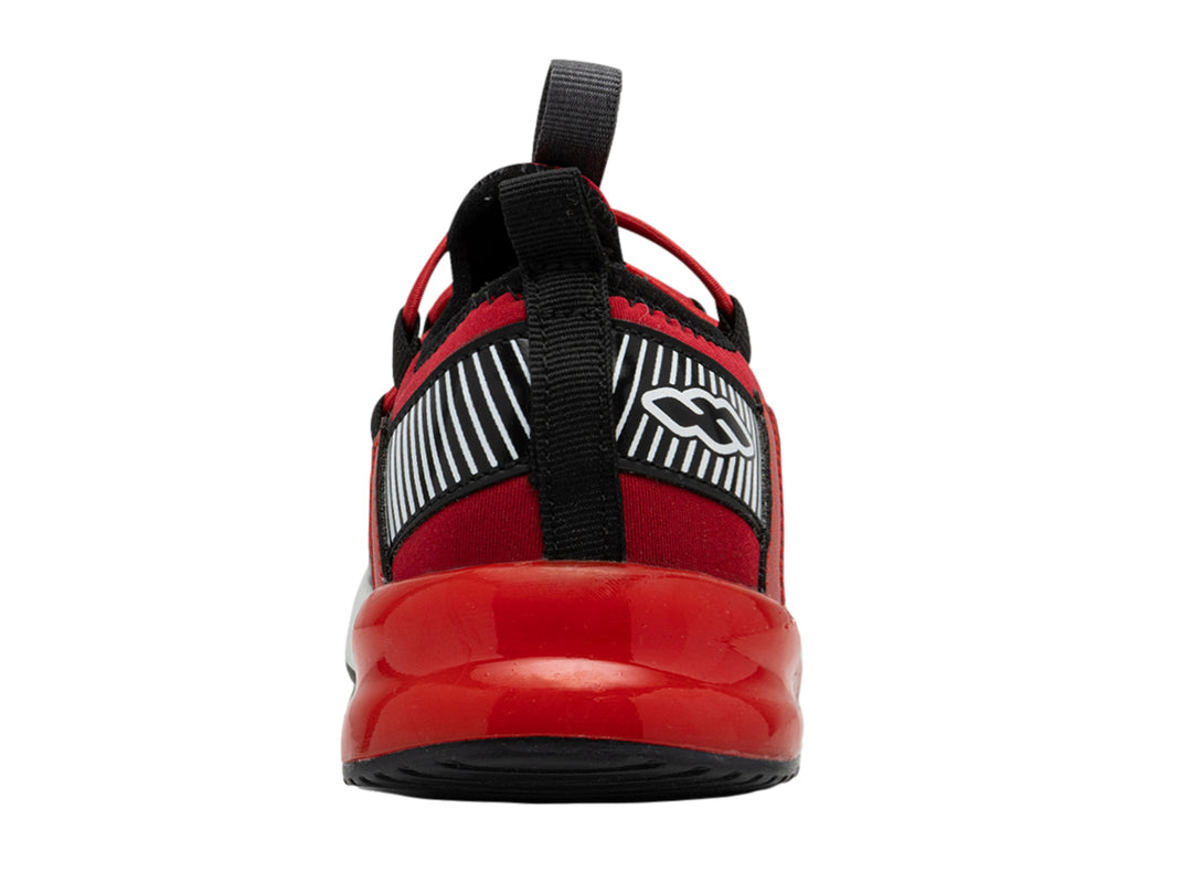Tenis deportivos para niño en color rojo con detalles en negro y suela blanca.