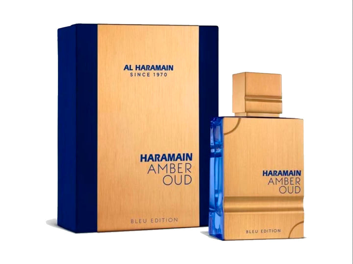 Perfume Al Haramain Amber Oud Bleu Edition con su caja en colores dorado y azul.