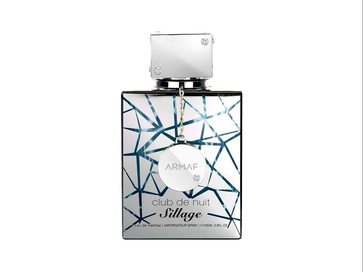 Perfume Armaf Club de Nuit Sillage de 105 ml con frasco y caja en color blanco y plata con diseño geométrico.