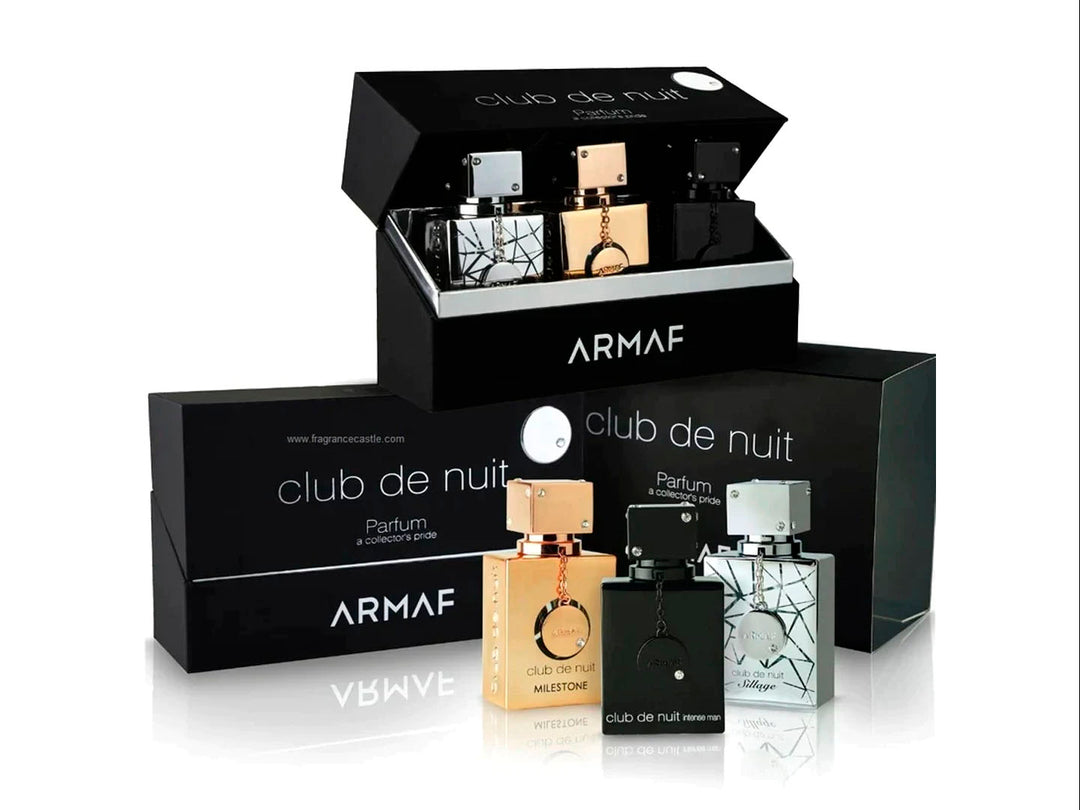 Set de 3 fragancias Club de Nuit de Armaf en frascos dorado, plateado y negro con su caja protectora.