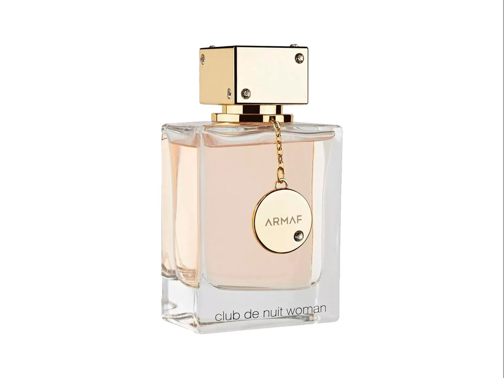 Perfume Armaf Club de Nuit Woman en botella de vidrio transparente con tapa dorada y su caja color rosa.