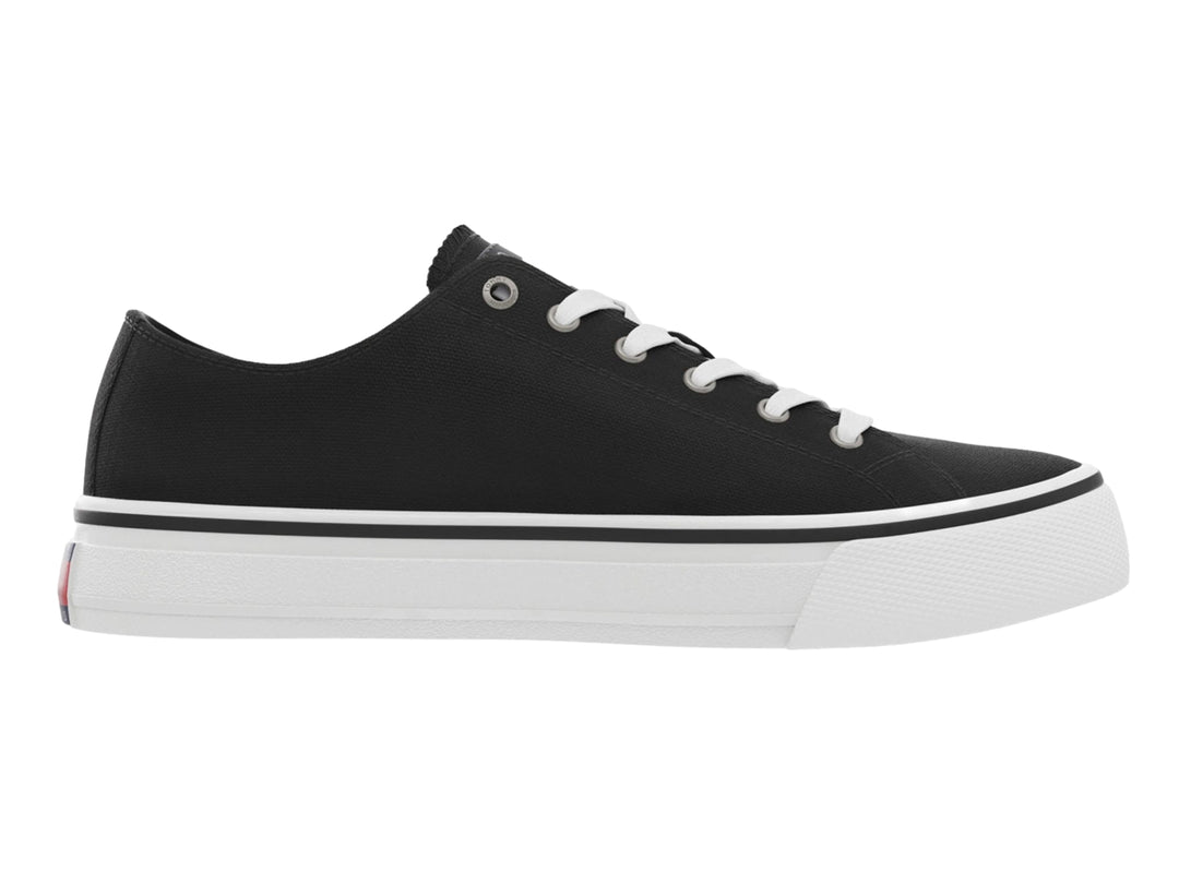 Tenis Tommy Hilfiger de lona color negro con suela y agujetas blancas, estilo skate.
