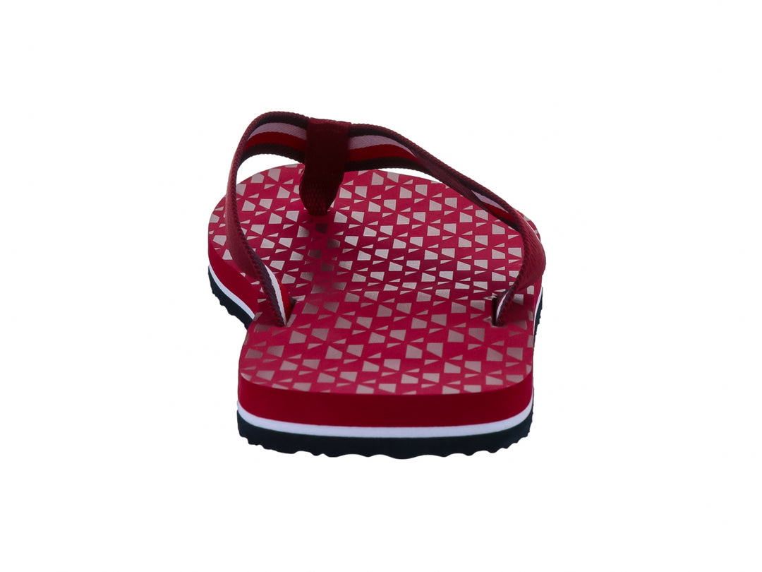Sandalias rojas Tommy Hilfiger con diseño geométrico en la plantilla y suela en contraste blanco y negro.