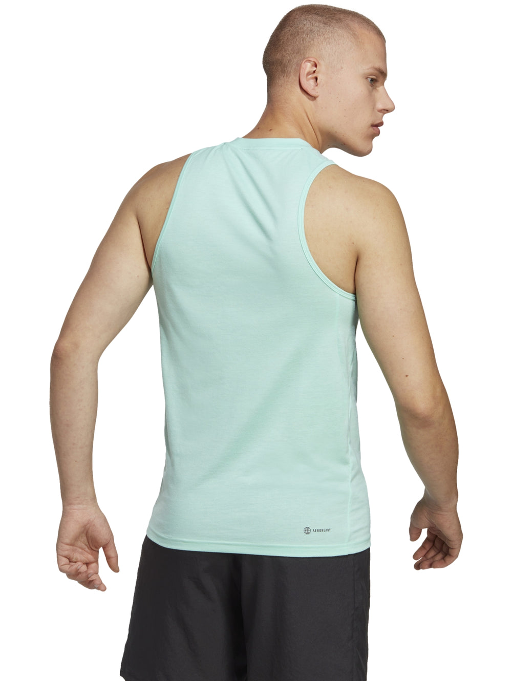 Camiseta deportiva sin mangas de color verde claro para hombre con logo de Adidas en el pecho.