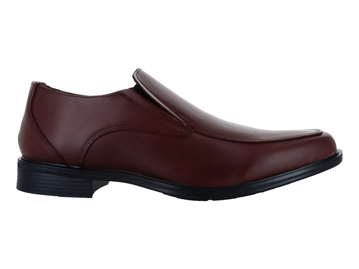Zapato formal tipo mocasín color tan con suela negra para hombre.
