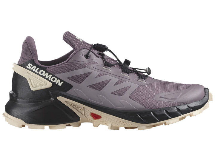 Tenis deportivos Salomon Supercross 4 color morado y negro con suela robusta y cordones rápidos.