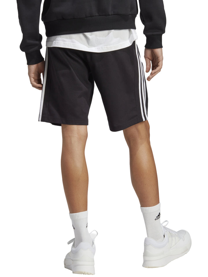 Pantalones cortos deportivos Adidas color negro con tres franjas blancas laterales.