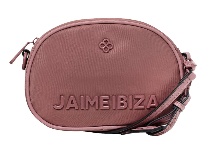 Bolso ovalado color blush de Jaime Ibiza con logo en relieve y correa ajustable.