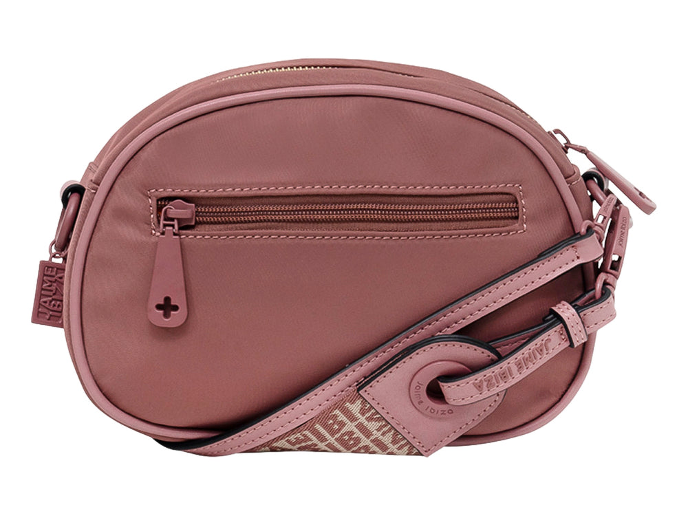 Bolso ovalado color blush de Jaime Ibiza con logo en relieve y correa ajustable.