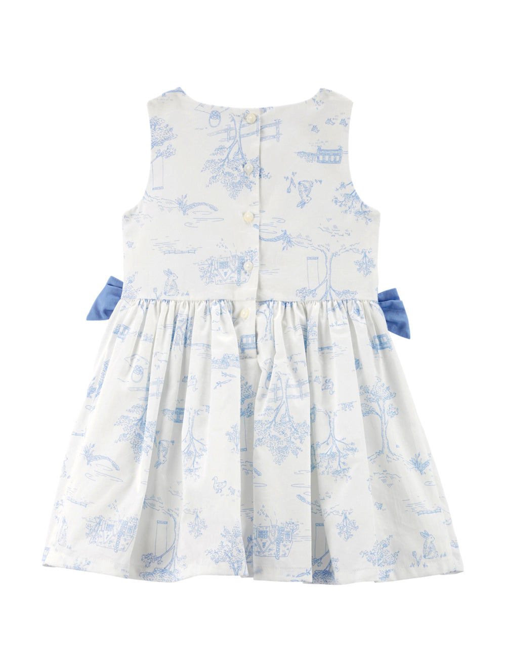 Vestido blanco para niña con estampado azul y moños azules en la cintura.