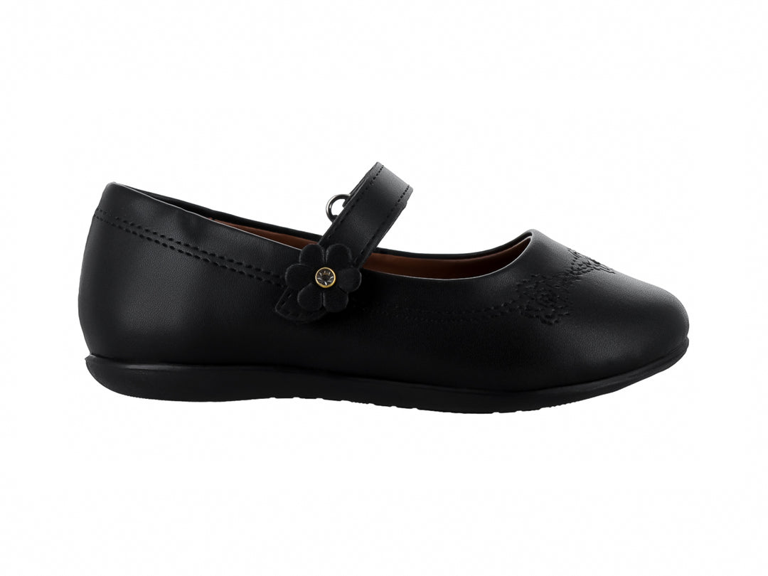 Zapato negro para niña estilo Mary Jane con detalle de flor y correa ajustable.