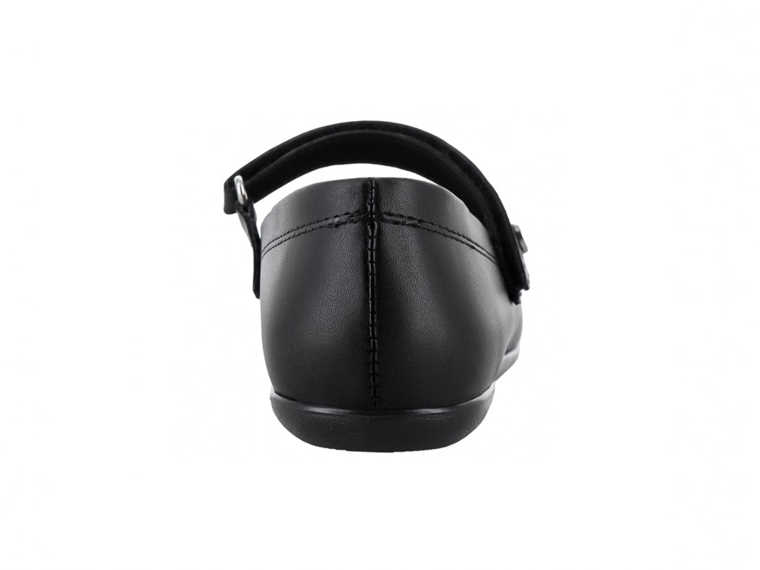 Zapato infantil negro tipo Mary Jane con moño decorativo y correa ajustable.