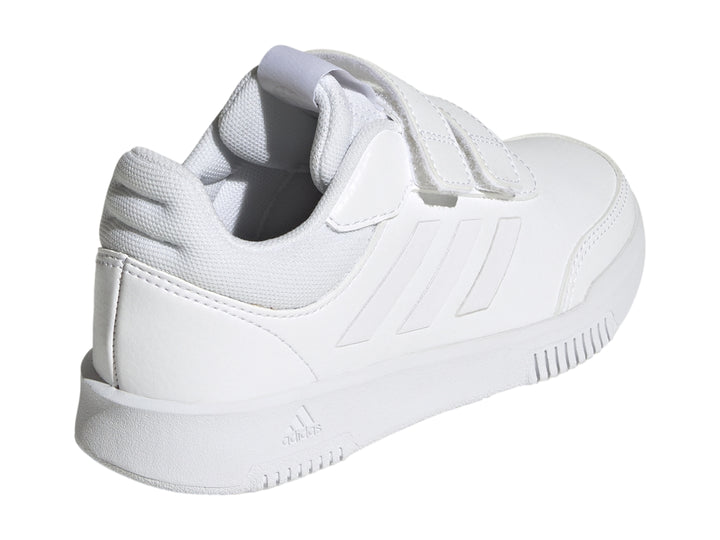 Tenis deportivos Adidas color blanco para niño con cierres de velcro.
