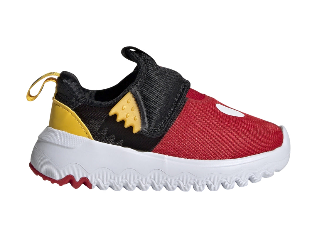 Tenis infantiles Adidas en colores rojo, negro y amarillo con suela blanca dentada.