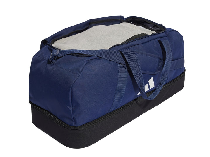 Bolsa deportiva Adidas en color azul con base negra y logotipo blanco frontal.