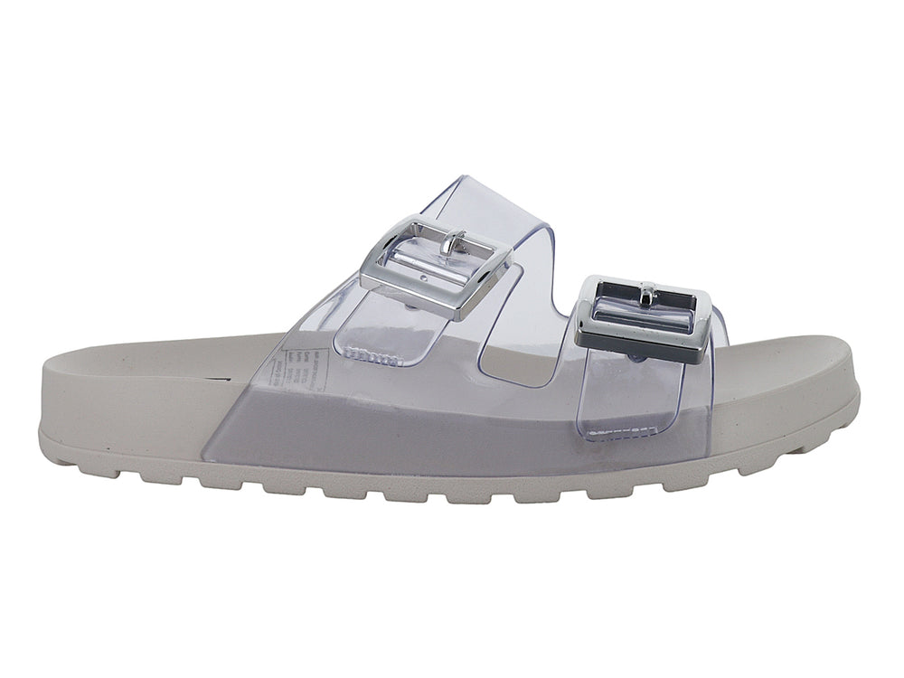 Sandalia Moleca blanca con correas transparentes y hebillas plateadas para mujer.
