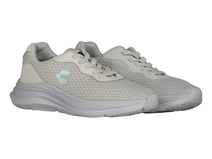 Tenis deportivos Charly color gris con tejido de malla y suela gruesa.