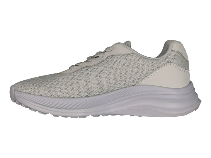 Tenis deportivos Charly color gris con tejido de malla y suela gruesa.