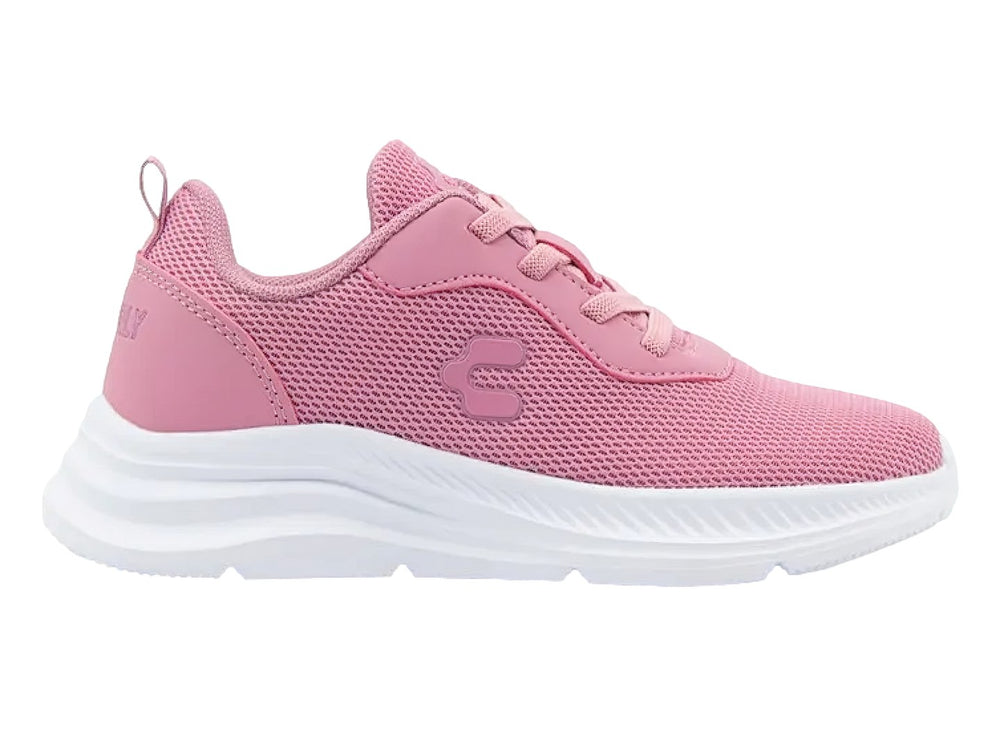 Tenis deportivos Charly color rosa con suela blanca y tejido de malla transpirable.