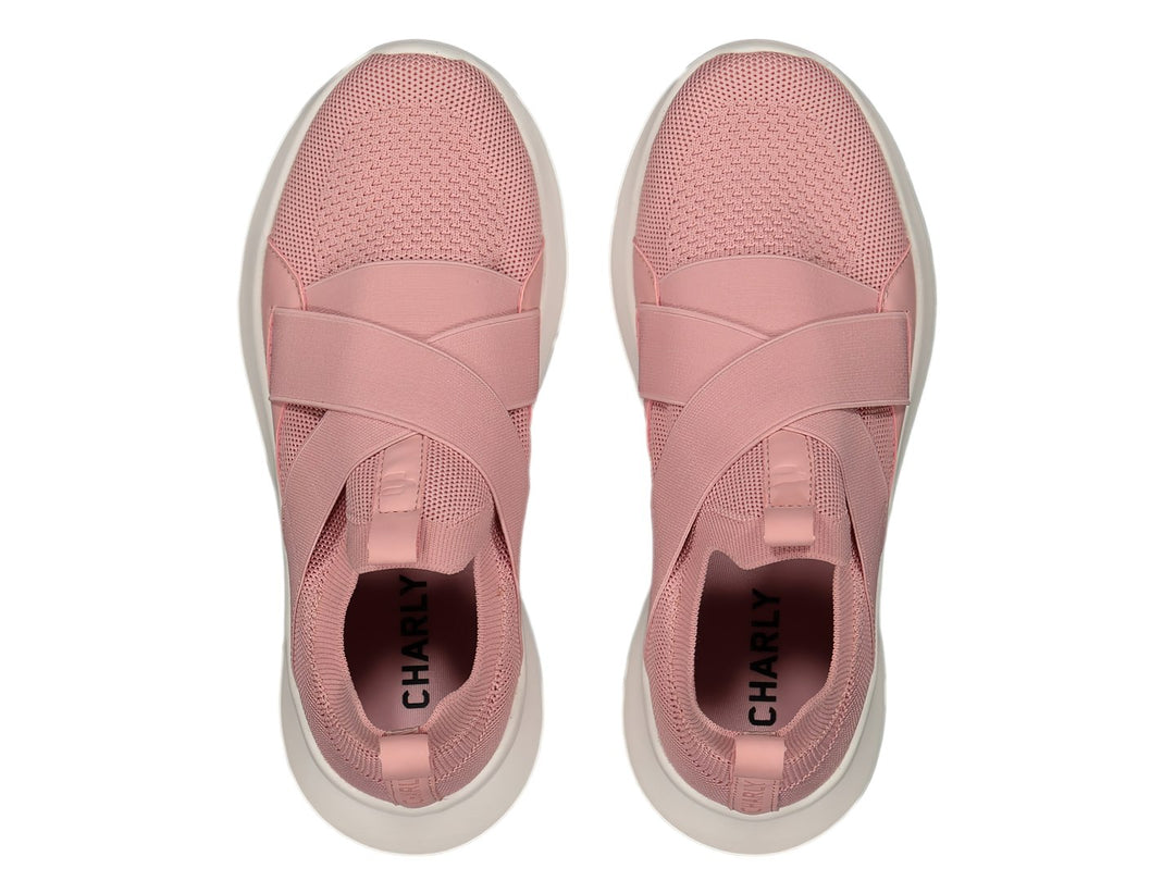 Tenis deportivos Charly color rosa con suela blanca y cintas elásticas cruzadas en la parte superior.