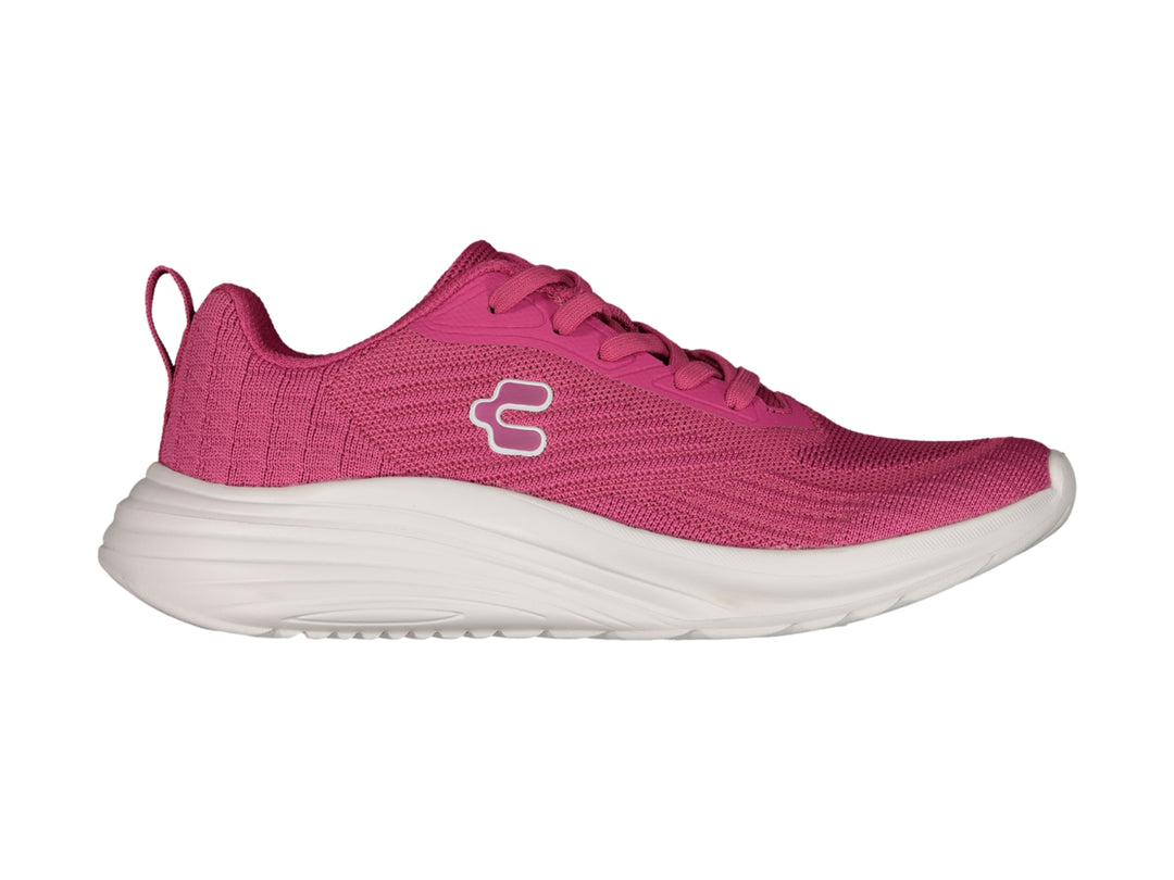Tenis deportivos Charly de color rosa con suela blanca y tejido transpirable.