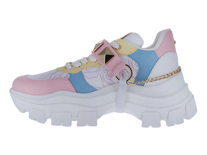 Tenis plataforma multicolor con suela blanca gruesa y detalles metálicos dorados.