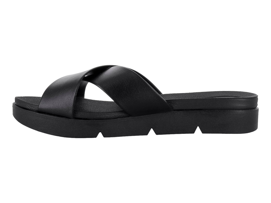 Sandalias negras de plataforma con tiras cruzadas en la parte superior y suela gruesa.