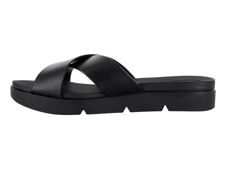 Sandalias negras de plataforma con tiras cruzadas en la parte superior y suela gruesa.