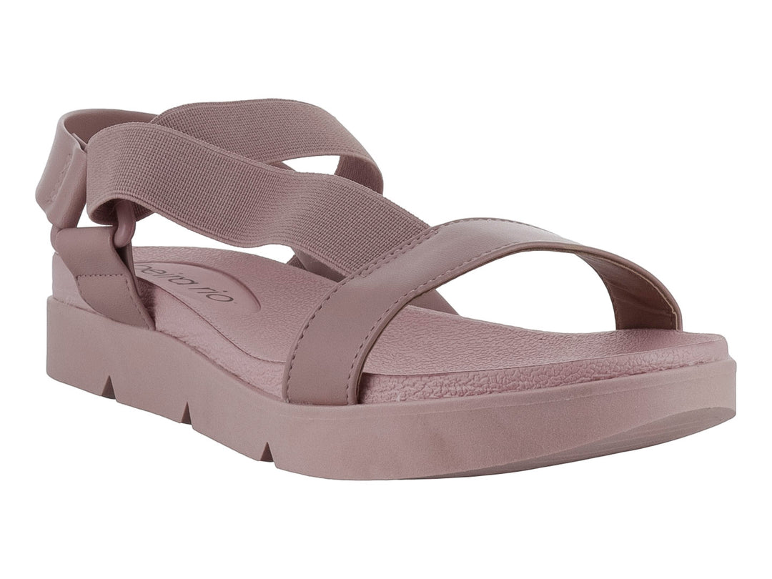 Sandalia de plataforma color rosa con correas elásticas y sintéticas, diseño casual y cómodo.
