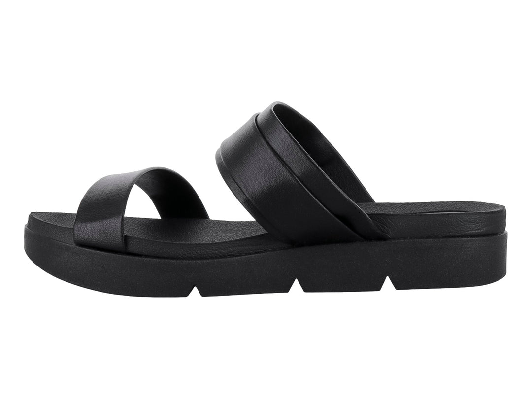 Sandalia negra de plataforma con hebilla dorada y diseño casual.