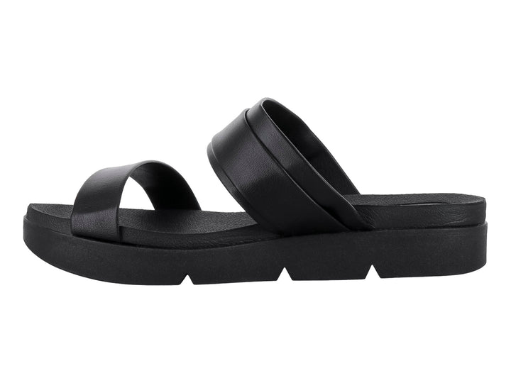 Sandalia negra de plataforma con hebilla dorada y diseño casual.