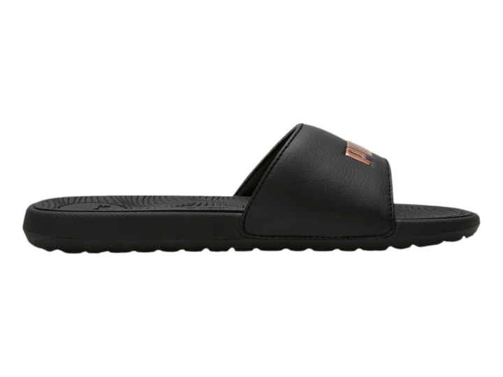Sandalia deslizante PUMA de color negro con logotipo en tono oro rosa.