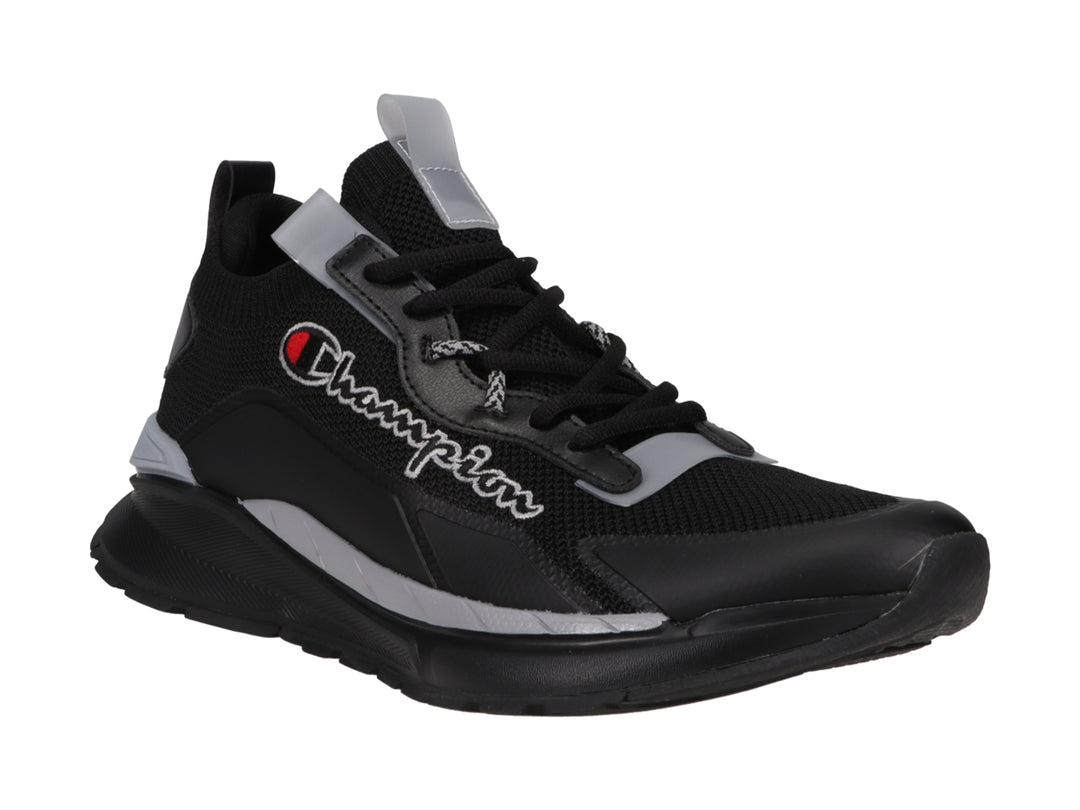 Tenis deportivos Champion en color negro con detalles en gris y logotipo blanco lateral.