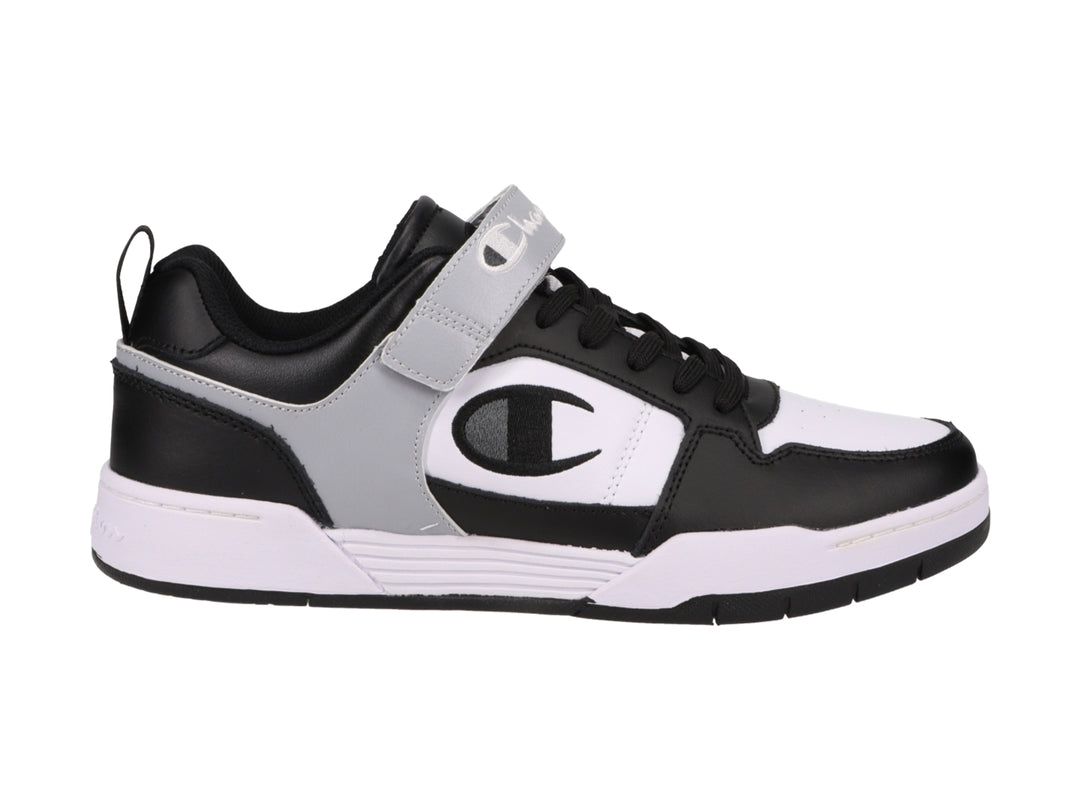 Tenis deportivos Champion Arena Lo CB en colores negro, blanco y gris con correa ajustable.