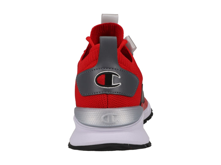 Tenis deportivos Champion color rojo y negro con suela blanca y detalles plateados.
