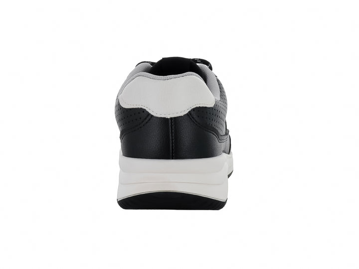 Tenis deportivos BR Sport en color negro con suela blanca y detalles laterales en blanco.
