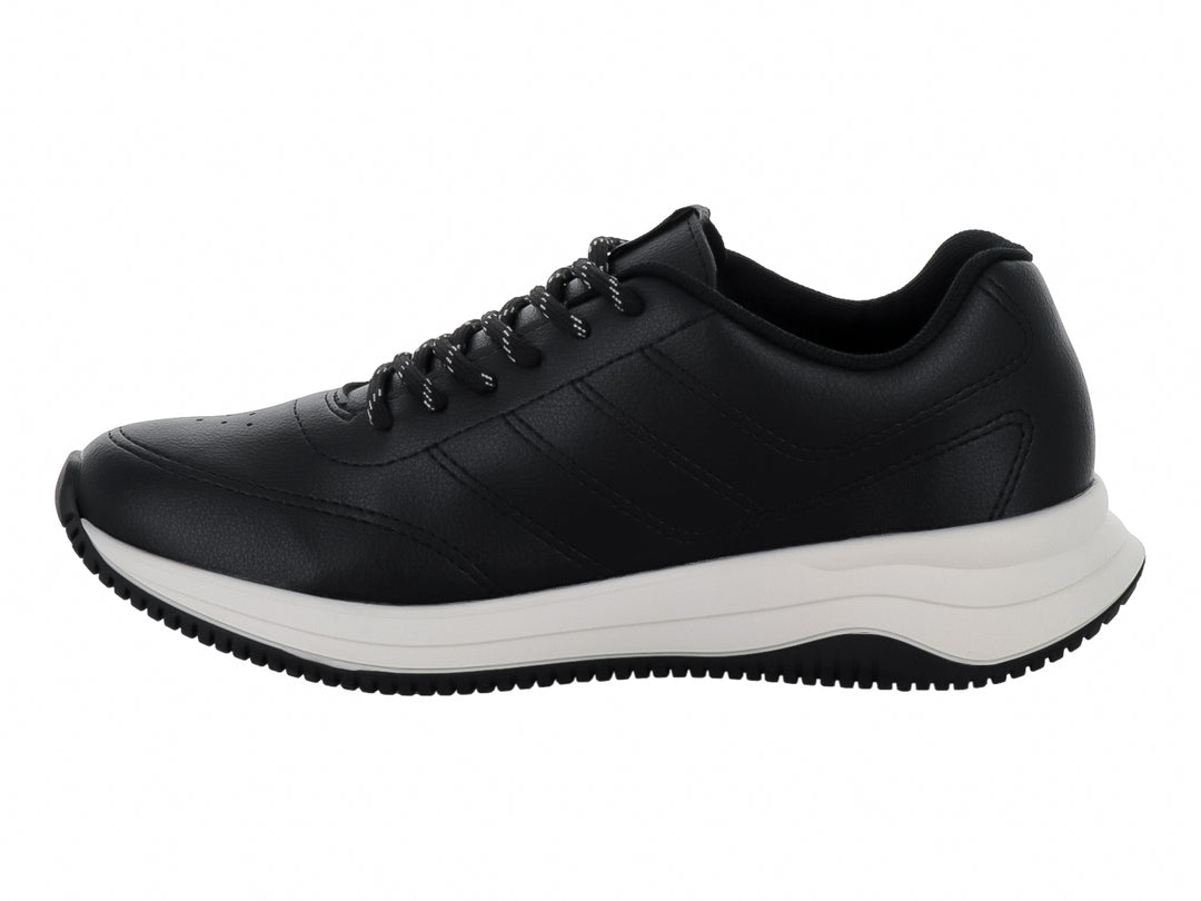 Tenis deportivos color negro con suela blanca y cordones, vista lateral.
