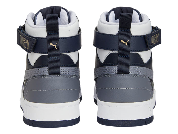 Tenis PUMA de cuello alto en colores blanco, gris y azul marino con suela blanca.