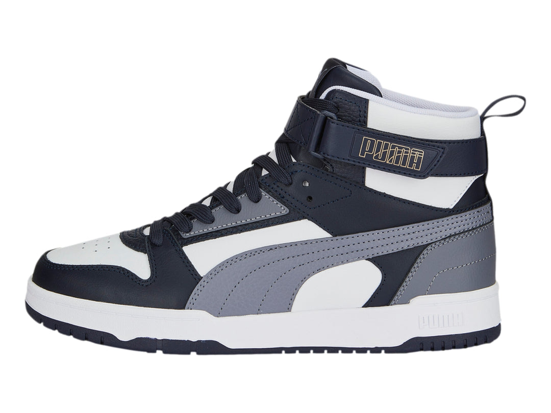 Tenis PUMA de cuello alto en colores blanco, gris y azul marino con suela blanca.