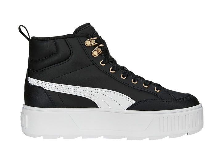 Tenis PUMA Carmen Mid color negro con suela blanca de plataforma y ojillos dorados.
