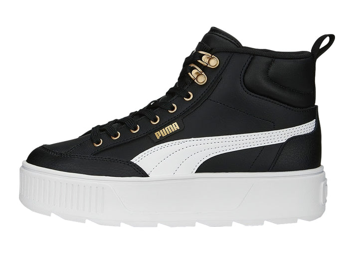 Tenis PUMA Carmen Mid color negro con suela blanca de plataforma y ojillos dorados.