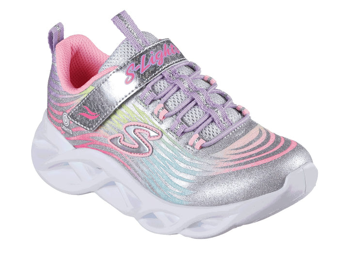 Tenis Skechers Twisty Brights para niña en colores multicolor con suela blanca ondulada y detalles brillantes.