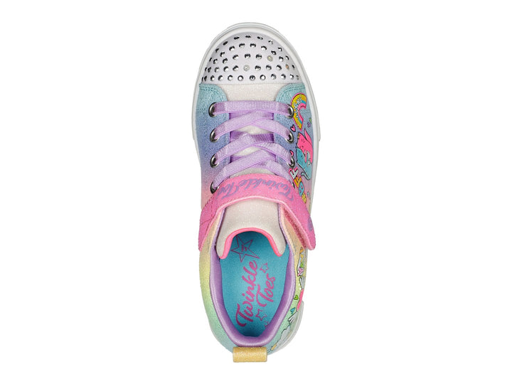 Tenis Skechers para Niña multicolor con estampados de unicornios, arcoíris y detalles brillantes en la punta.