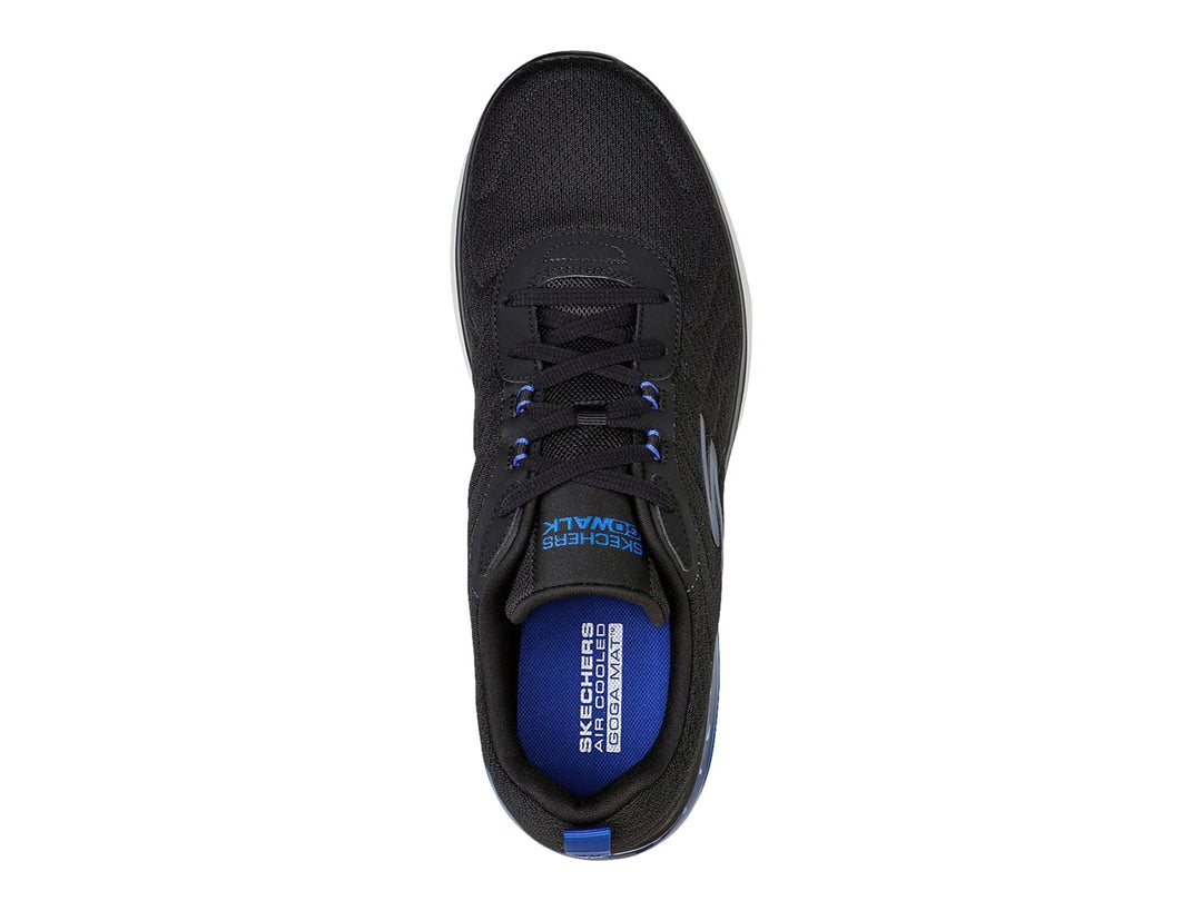 Tenis deportivos Skechers color negro con suela blanca y cámara de aire azul.