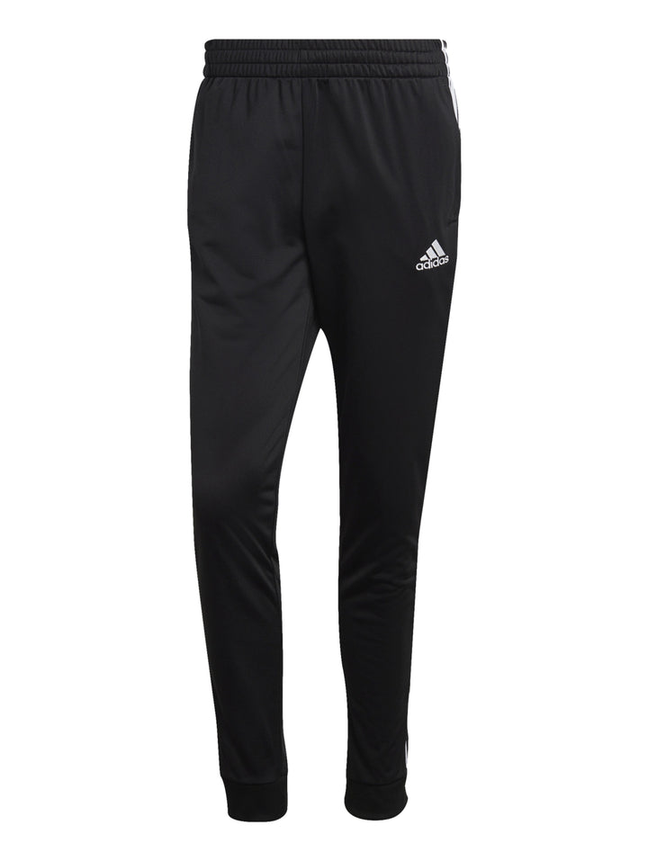 Conjunto deportivo Adidas negro con tres franjas blancas laterales, incluye chaqueta y pantalón.