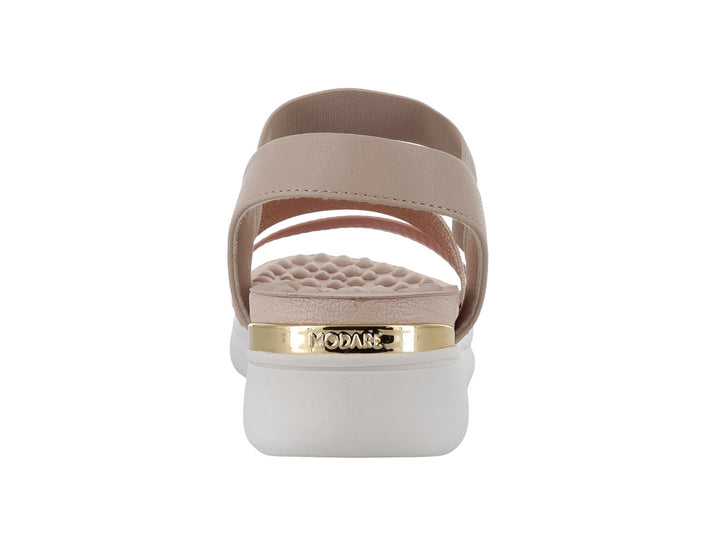 Sandalia Modare para mujer en color beige con correas brillantes y suela blanca de plataforma.